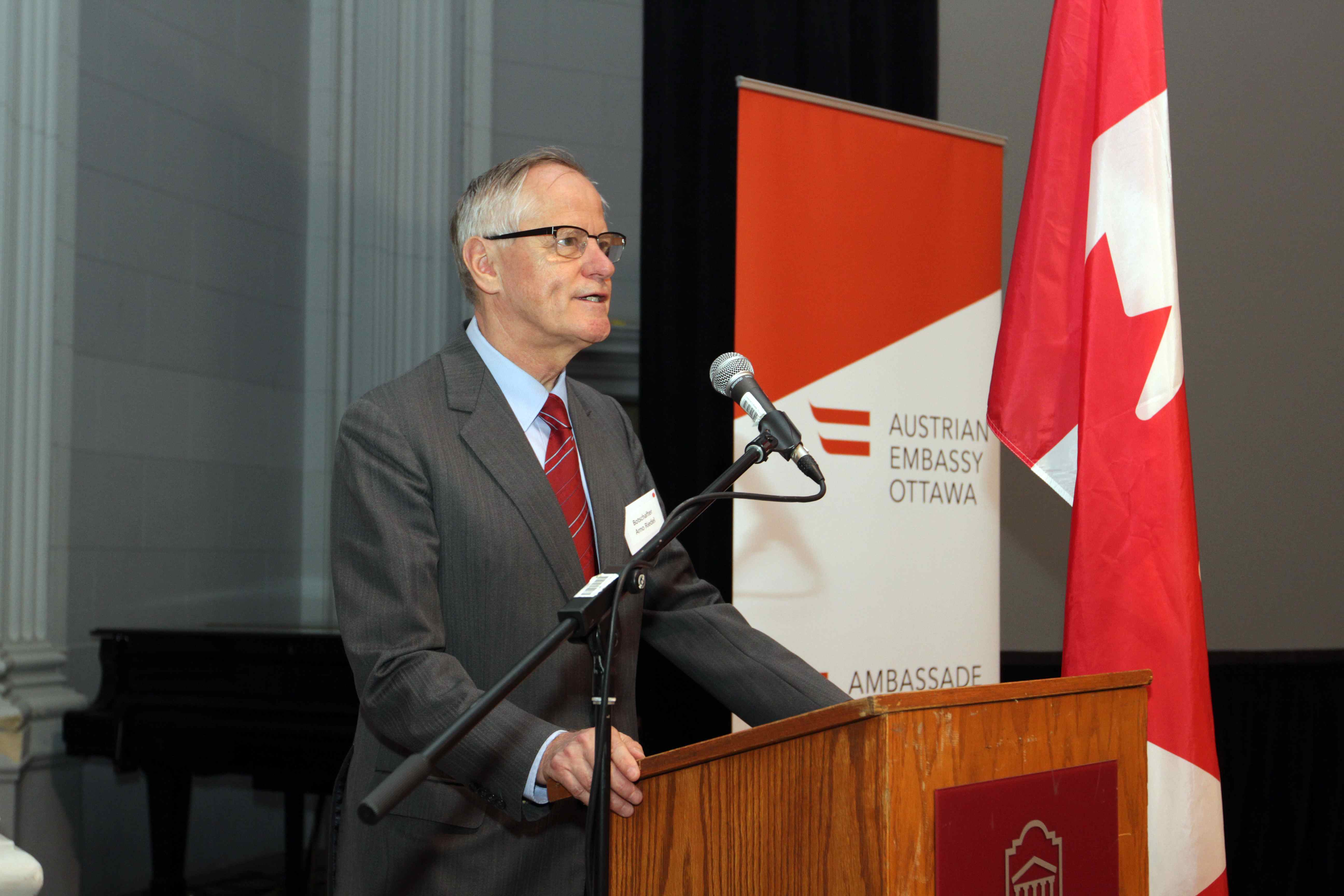 Amb. Riedel addresses the symposium